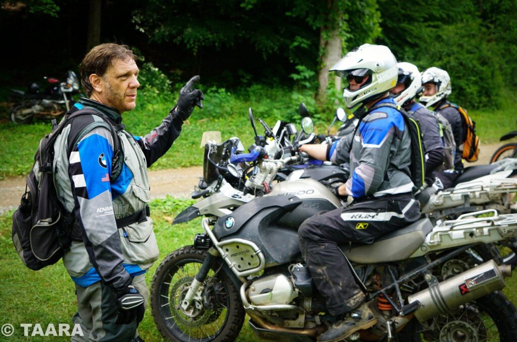 Off-road Clinic Tom Asher instructing a group of riders